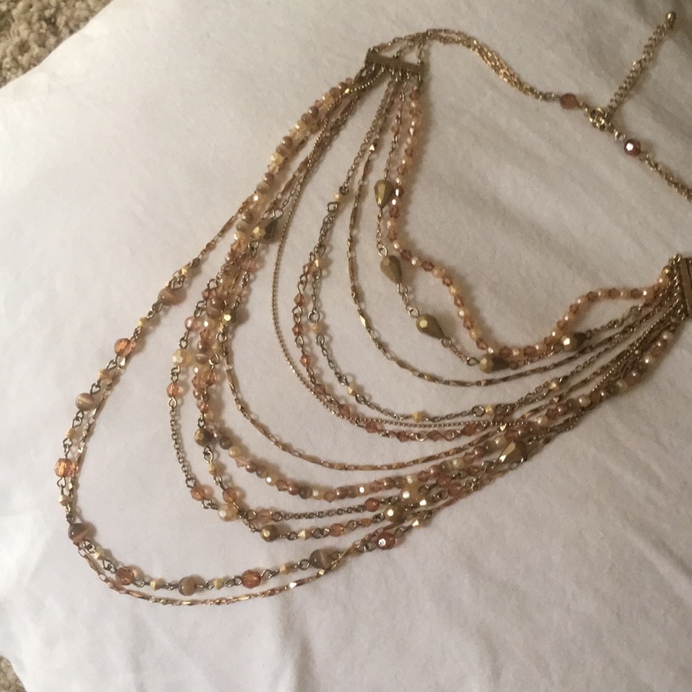 Gold chains and beaded necklace